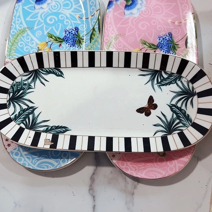 骨瓷陌****吗15个盘子