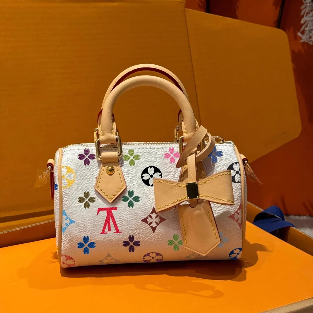 香港正品真皮女包2026新款老花白三彩枕头包迷你手提单肩斜挎包女