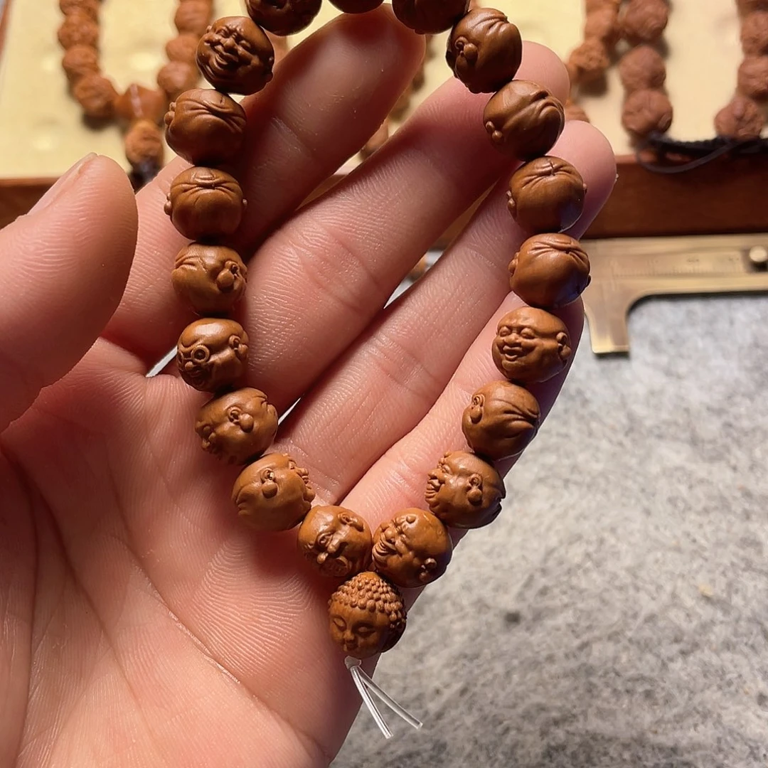 龙纹桃核雕刻百态