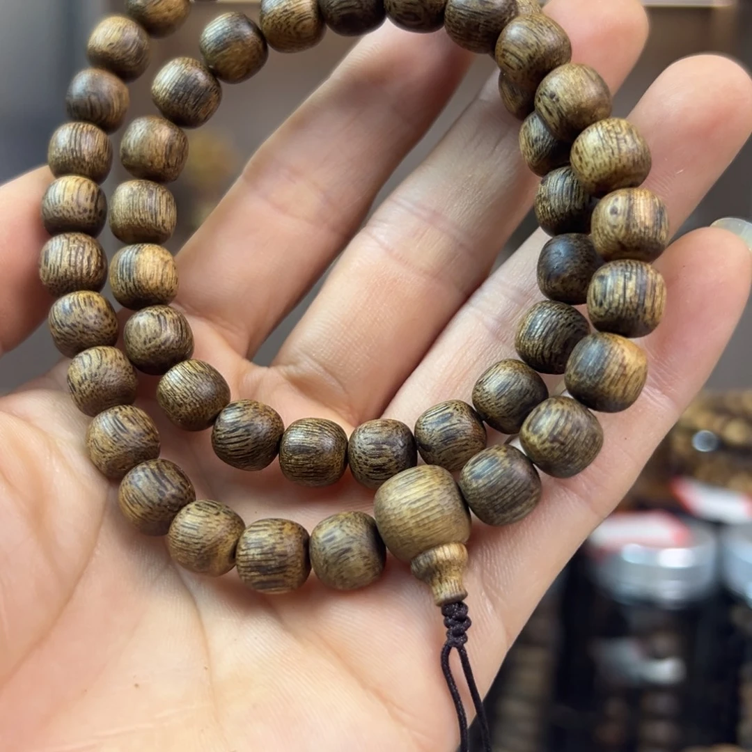 沉香碎屑沉香蓝宝石品种卡0.8双圈14.3克