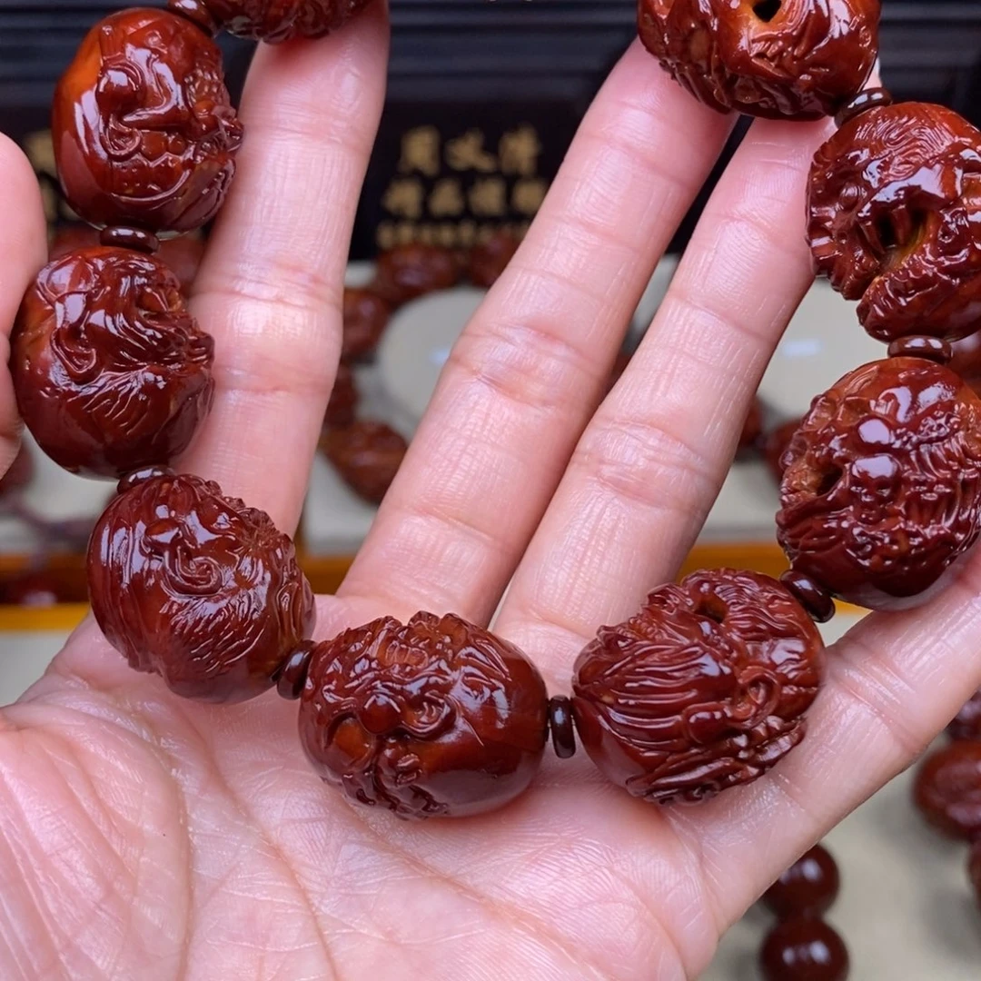 豪***强橄榄核吊坠向死而生