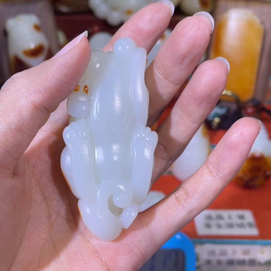 天***。和田玉未镶嵌把件