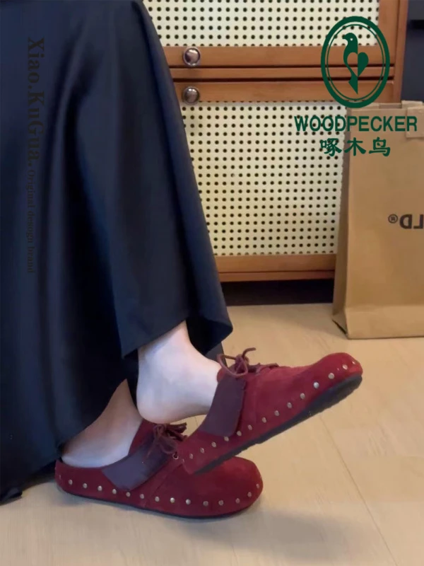 啄木鸟铆钉包头半拖鞋女外穿2025新款秋季厚底勃肯鞋一脚蹬穆勒鞋