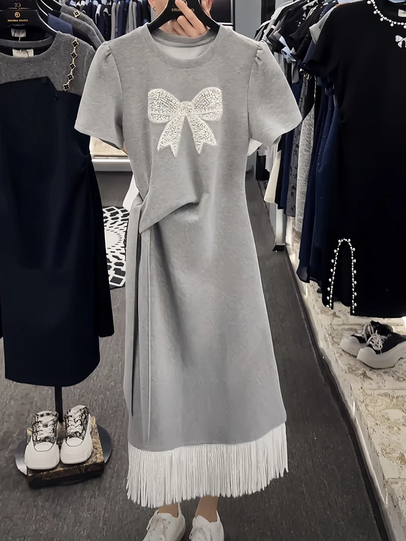 重工烫钻蝴蝶结流苏下摆连衣裙女2025夏季新款绑带收腰显瘦中长裙