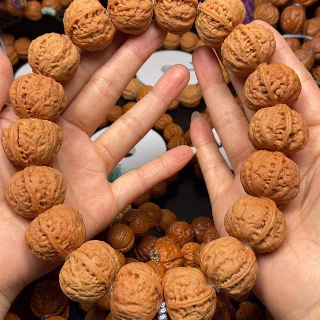 桃核手串玉**风肉筋桃心