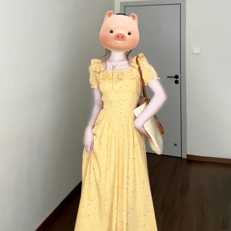 2025新款茶歇黄色碎花连衣裙子女夏季气质方领泡泡袖度假长裙2802