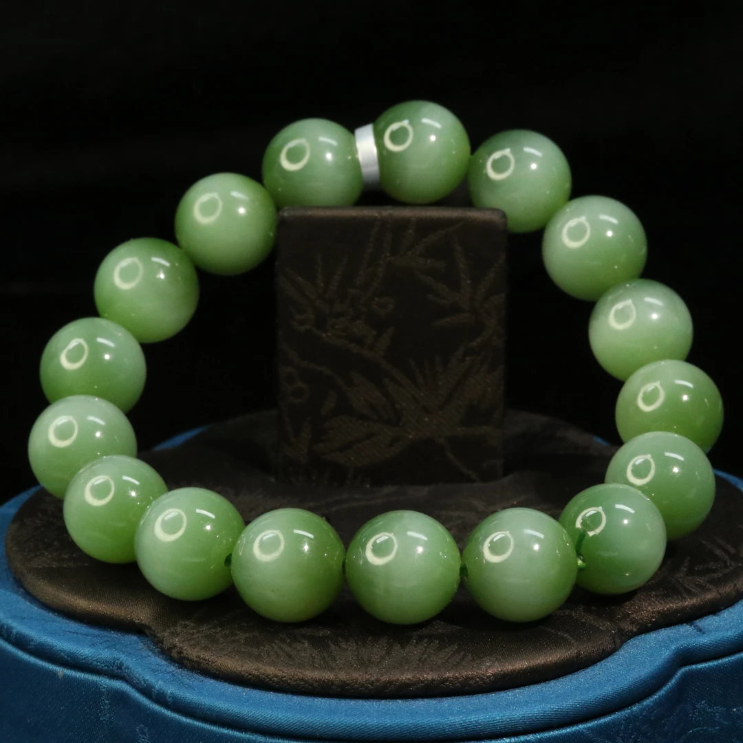 14和田玉碧玉猫眼一线极光手串/300115保利厦门拍卖