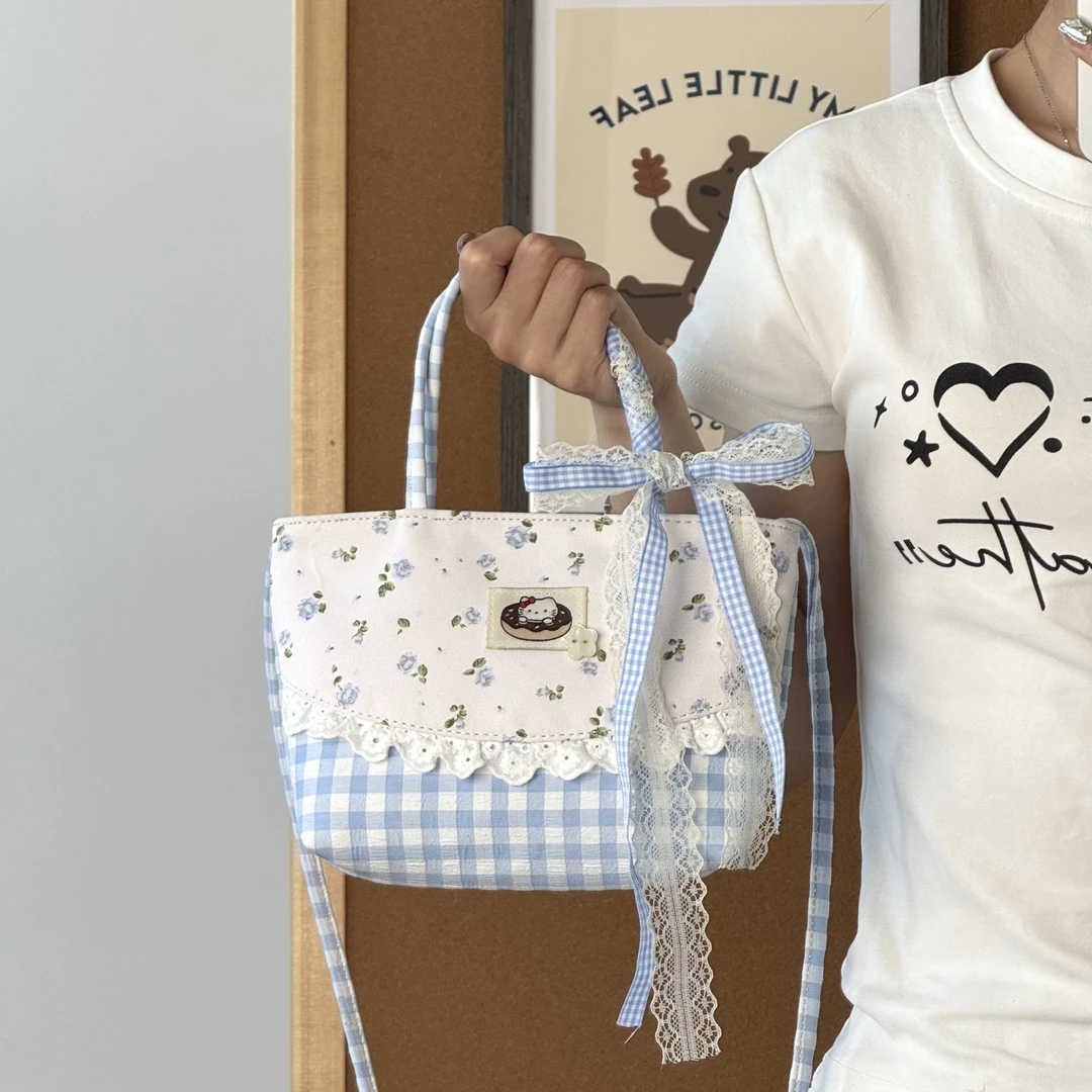 一张同学【长约20宽6高15单位厘米】手提斜挎包C6562蓝色不带公仔