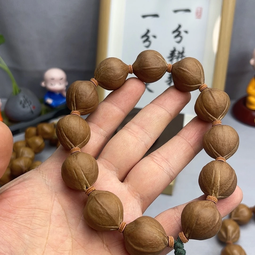 静***斯手串橄榄核20蜜桃短圆