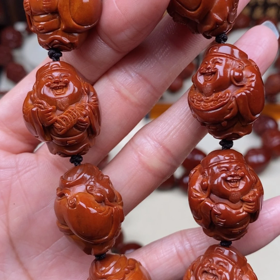 橄榄核吊坠张*毅八宝财神