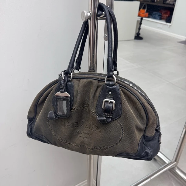 95新 Prada/普拉达 觅时/黑棕暗纹logo保龄球/118126