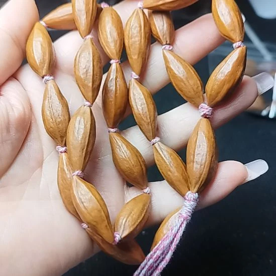 橄榄核雕刻素串手串