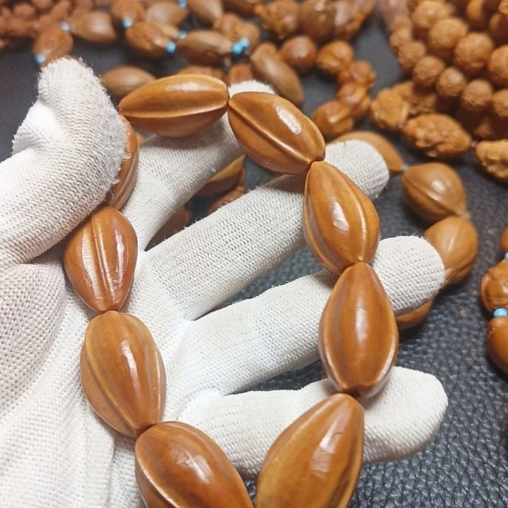 呵***宝橄榄核吊坠橄榄核