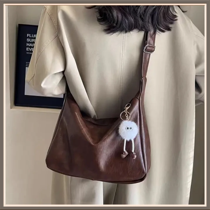 简约大容量包包女2025新款XZJD时尚百搭休闲单肩包通勤斜挎【多宠】