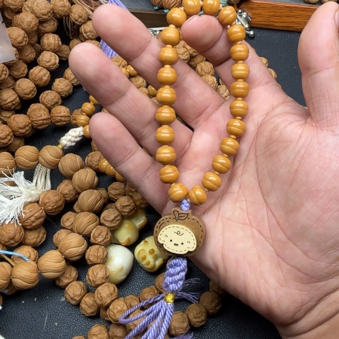 朵****猴头核桃手串加个跑环葫芦