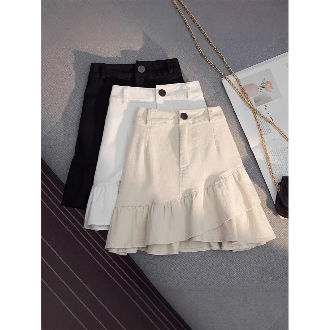 不规则秋防走光白色牛仔短裙女高腰a字包臀荷叶边半身裙显瘦2025