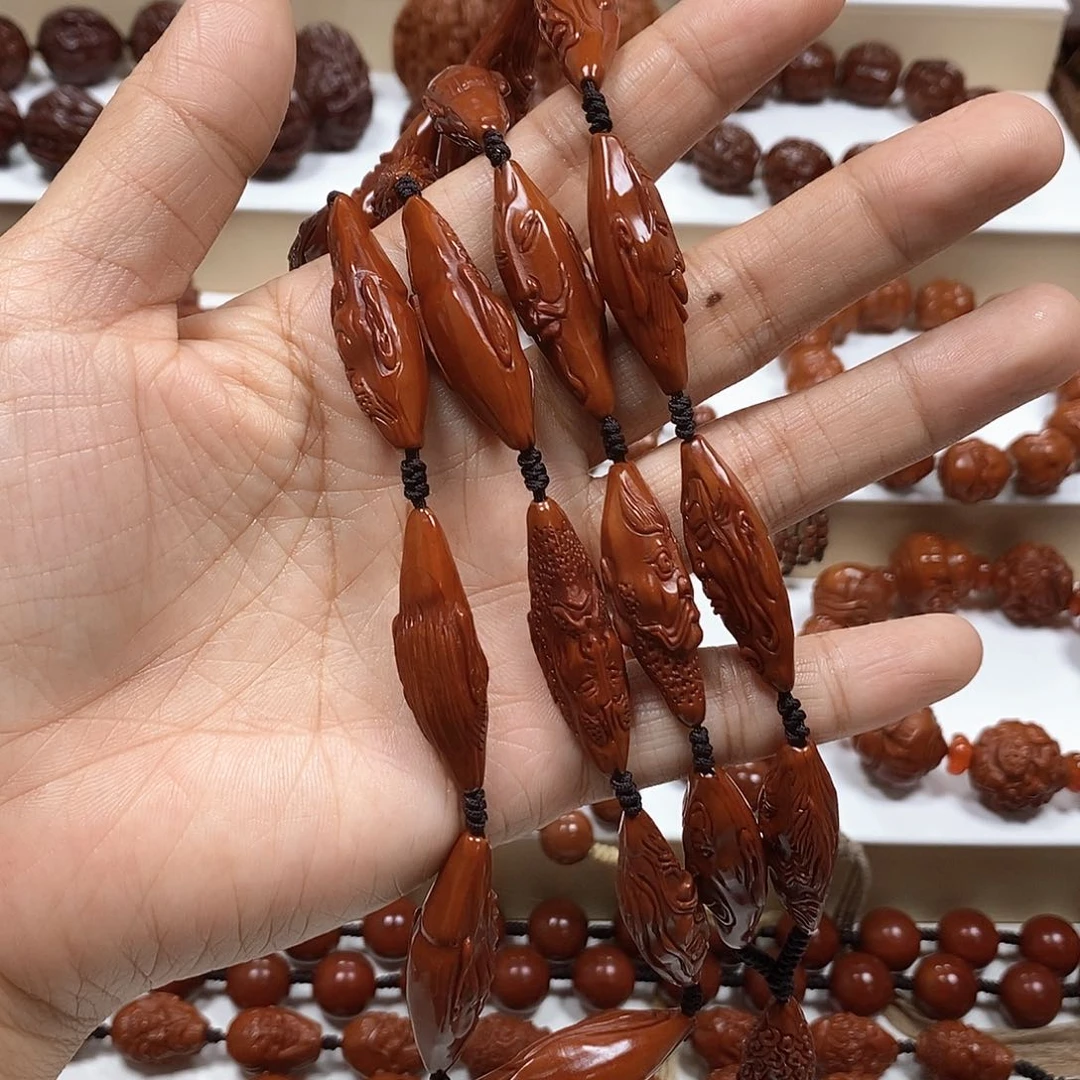 橄榄核吊坠袁*志橄榄核