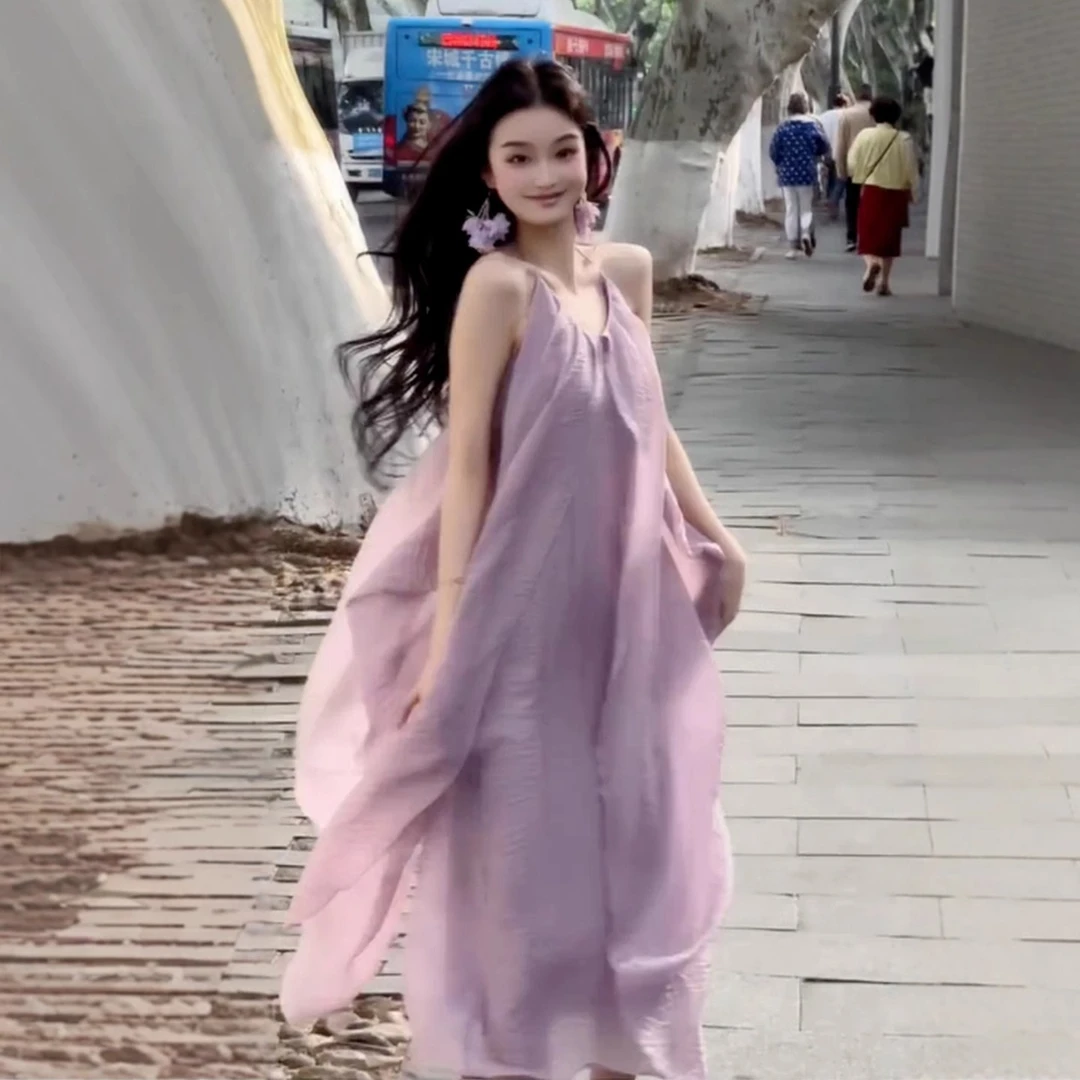 2025新款法式紫色挂脖吊带连衣裙子女夏季度假风气质v领仙女长裙