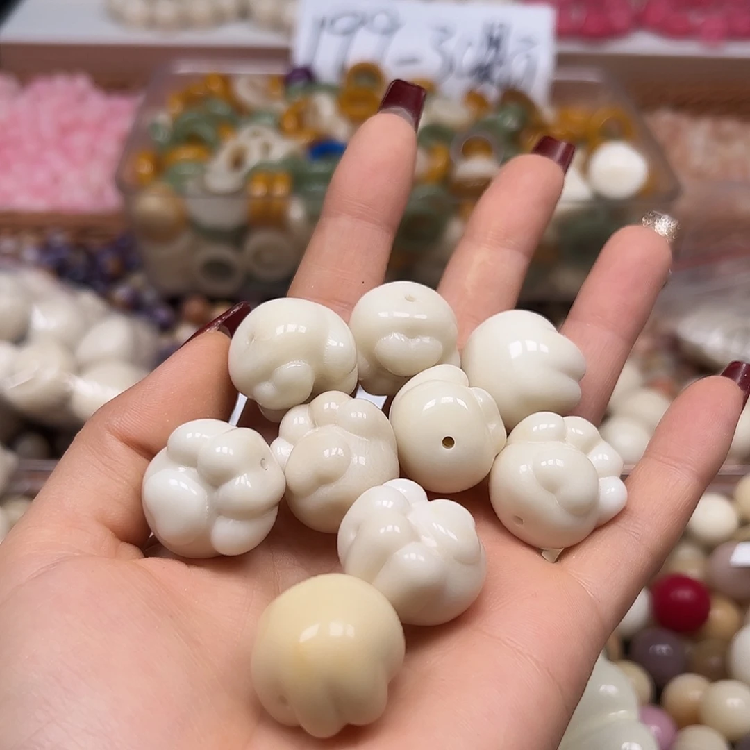 手串菩提根/象牙果瑕疵白熊爪9颗有裂