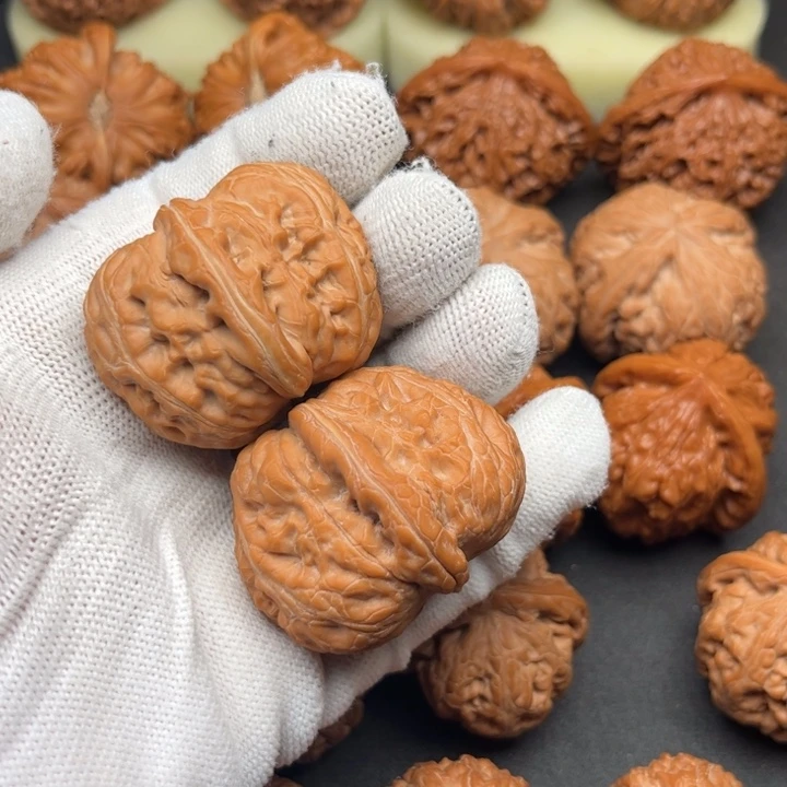 佚***名文玩核桃吊坠元宝 注：打底盘玩后不退换