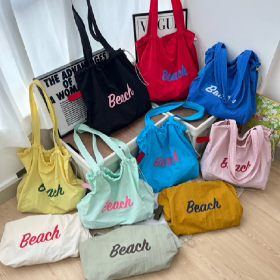 韩版字母印花大容量尼龙单肩包·休闲百搭便携抽绳托特包