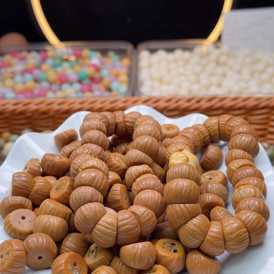 白玉菩提吊坠a15mm/22+1颗象牙果瑕