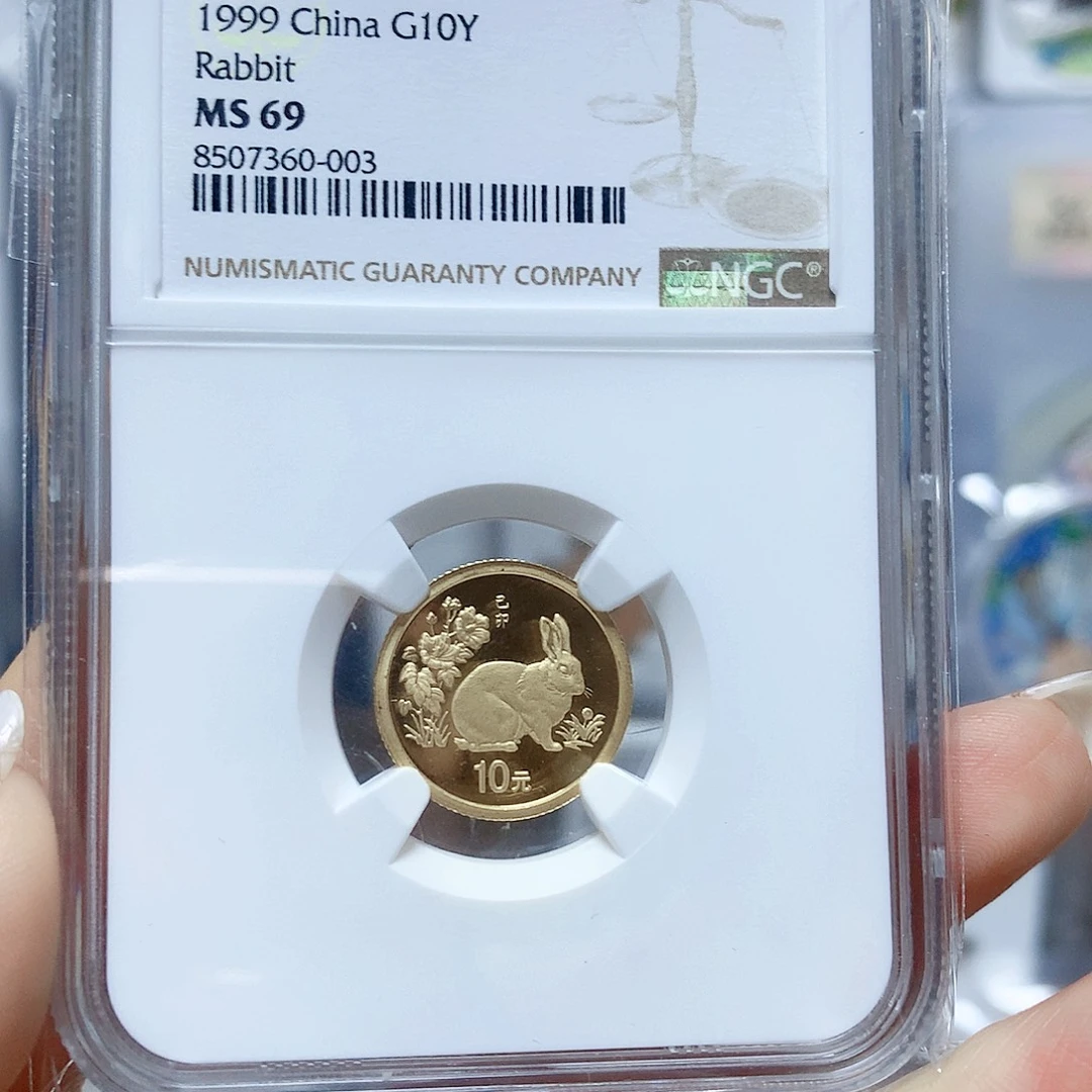 纯金1999年69分本金兔1/10金有证