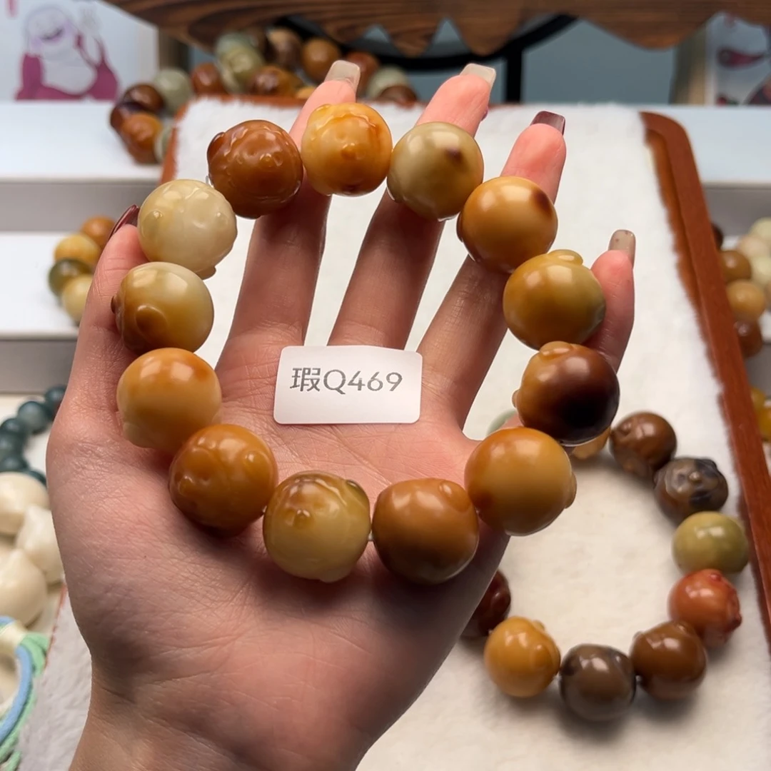 菩提根/象牙果手串?**梓20mm瑕猪猪一串q469