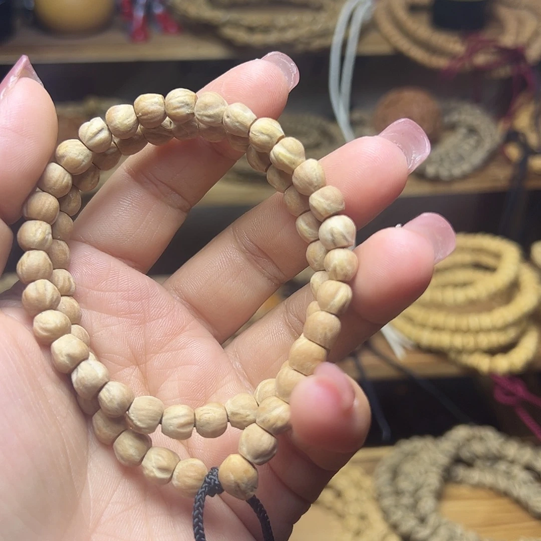 倘***.柏香籽/百香籽吊坠