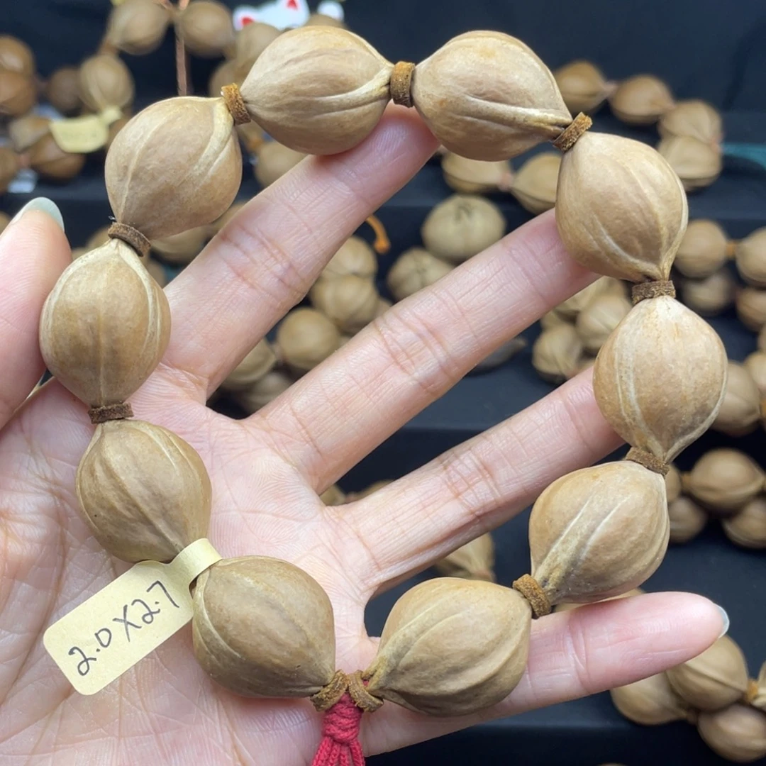 鼹***奕001橄榄核三花20*27