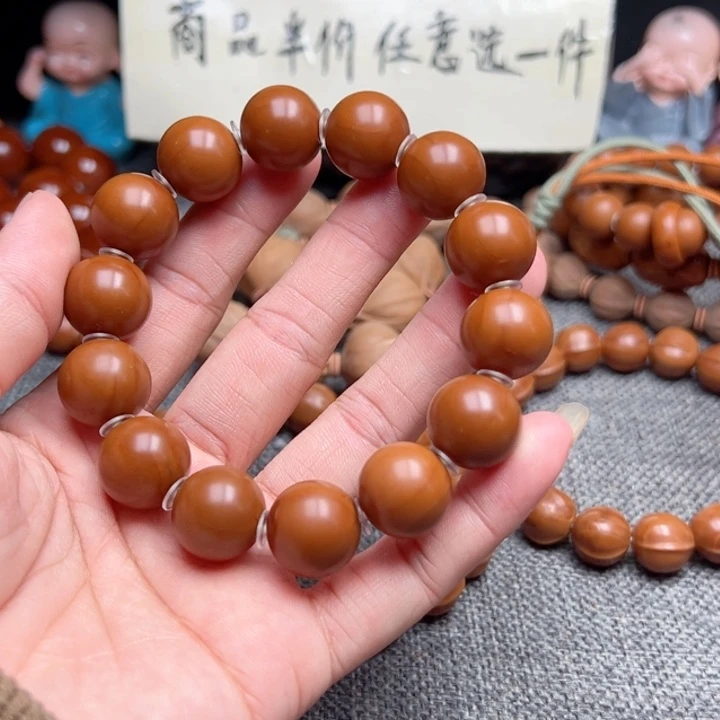 吴***人橄榄核手串1.5全品