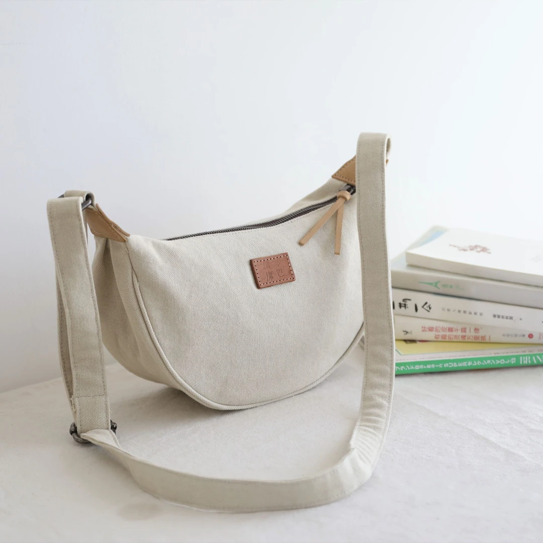 庸庸文艺小布包百搭原创饺子包女斜挎帆布包时尚休闲日系单肩包