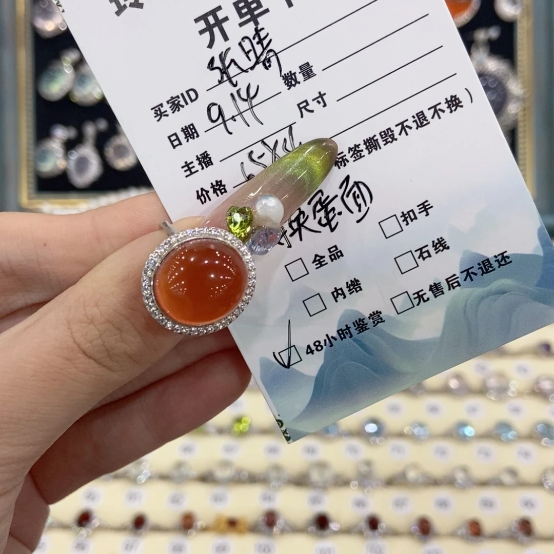 张***晴银S925镶嵌蛇纹石玉戒指