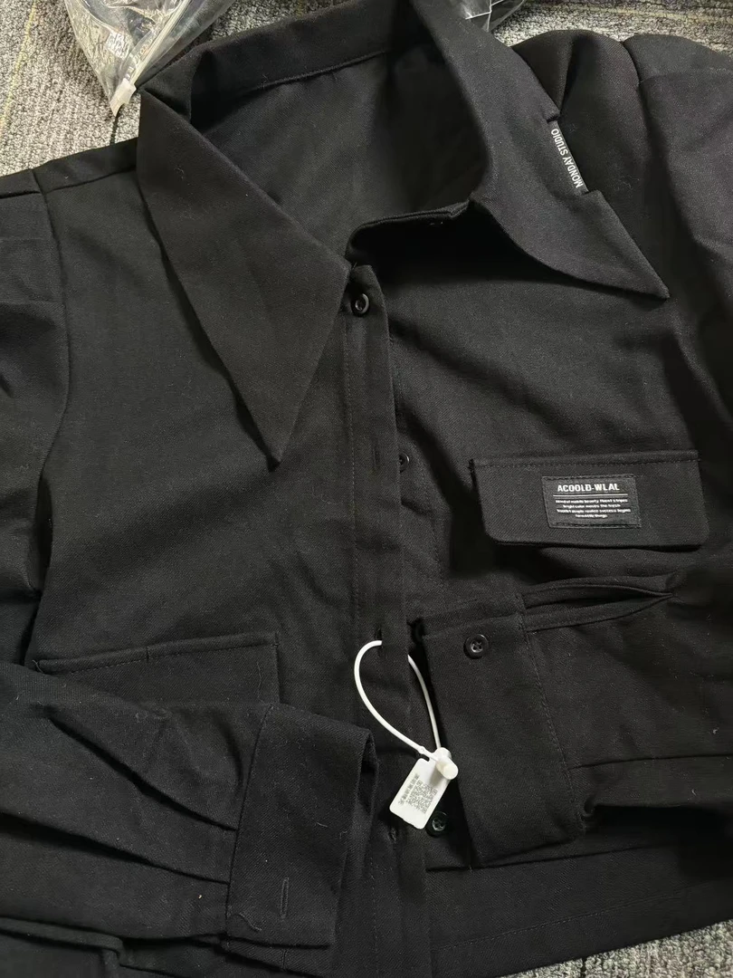 深圳南油秋冬新款单尖领黑色衬衫