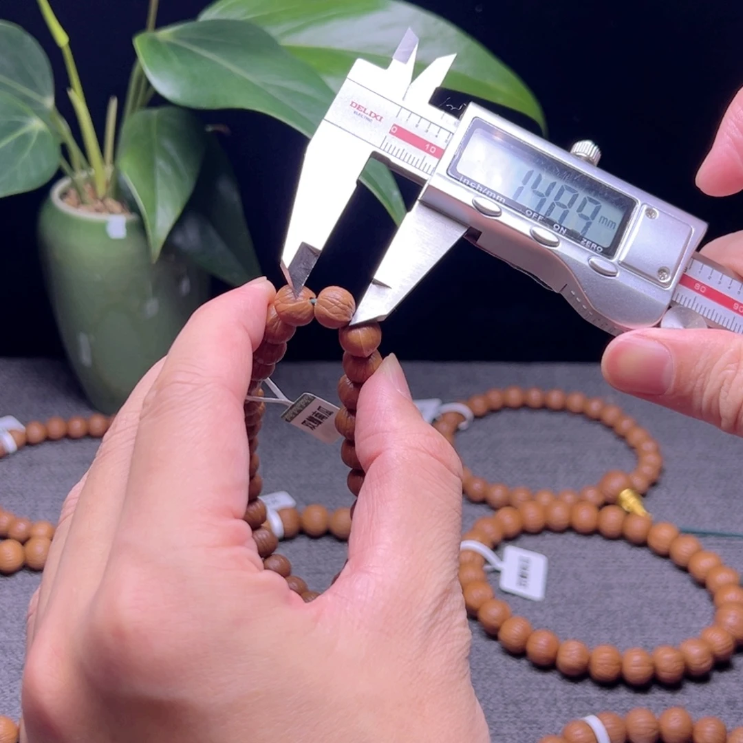 勿****吊坠猴头核桃凤羽