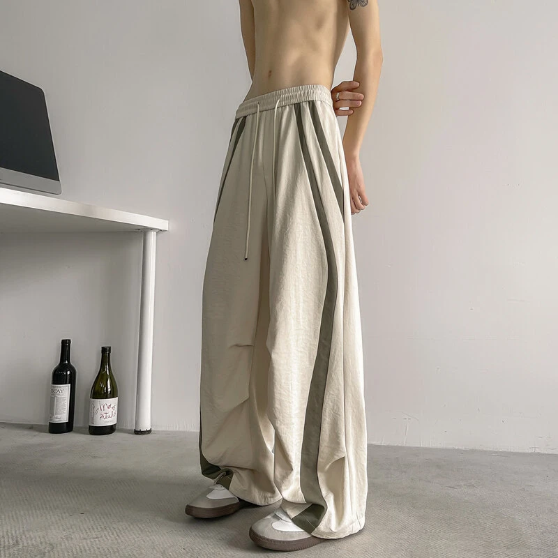 米白色拼接弯刀裤子男款春装美式高街冰丝阔腿长裤潮牌褶皱伞兵裤