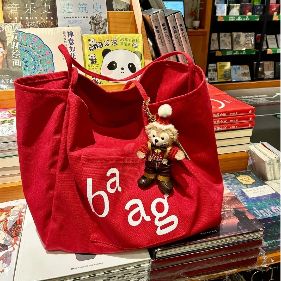 韩系慵懒风大容量红色字母帆布包2025新款百搭学生上课通勤托特包