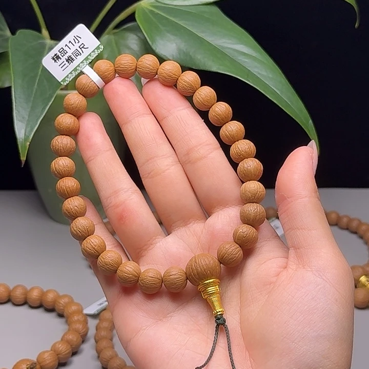 এ***阳吊坠猴头核桃凤羽