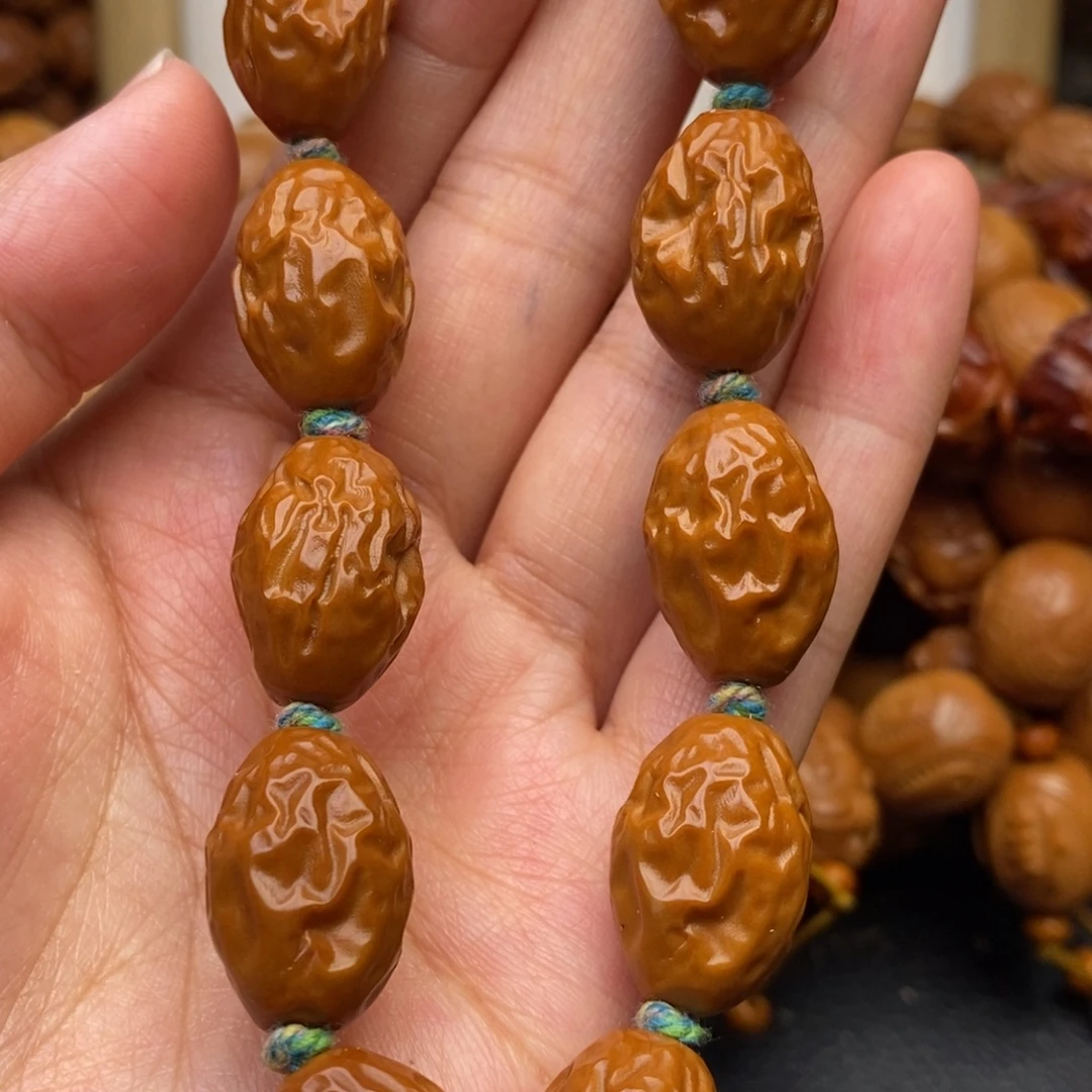 手串橄榄核红枣手串