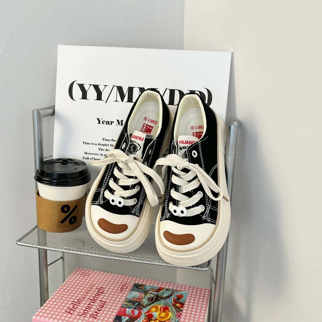 环球女鞋黑色帆布鞋女款2025新款爆款鞋子小众百搭板鞋时尚休闲鞋