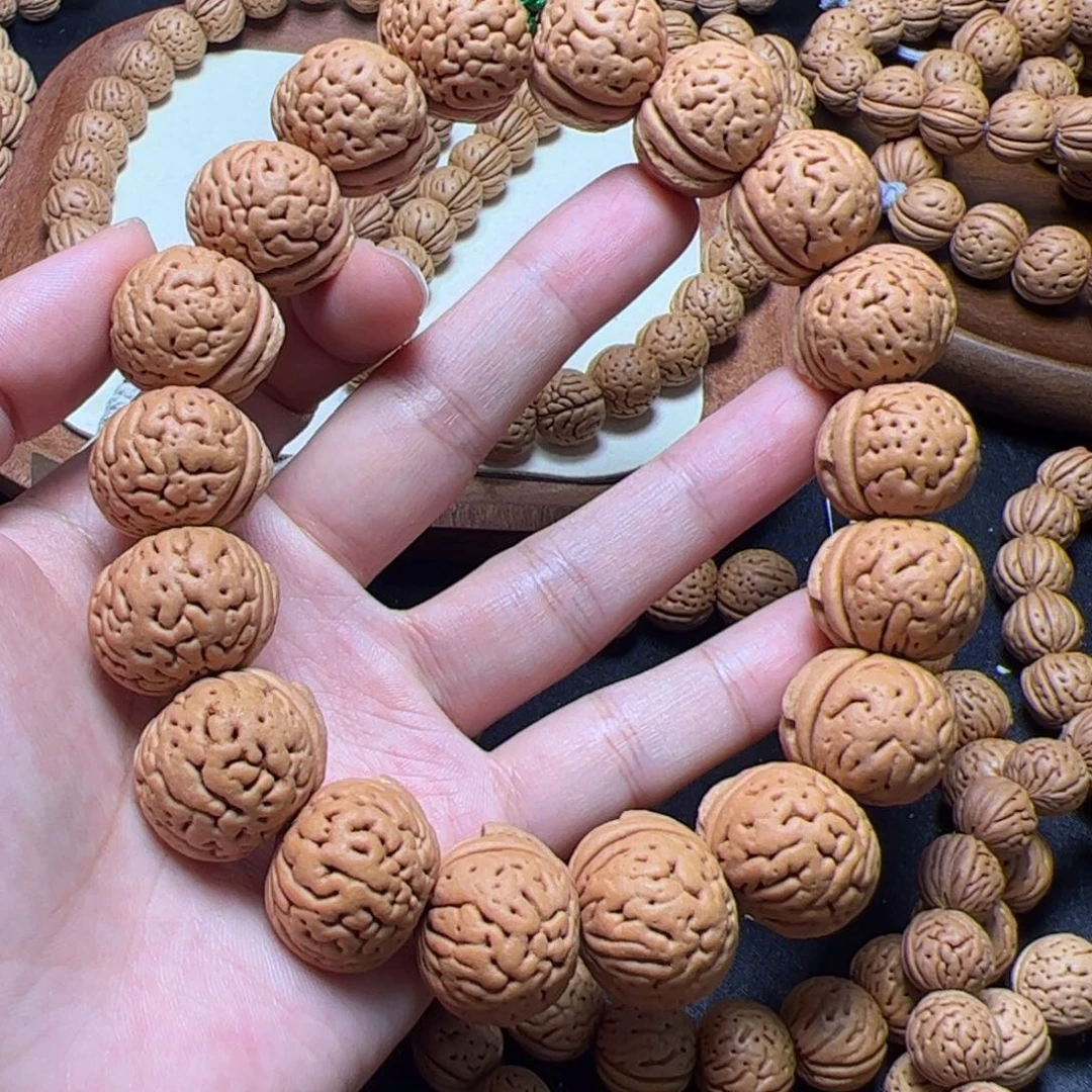20+金鱼肚桃核手持全品