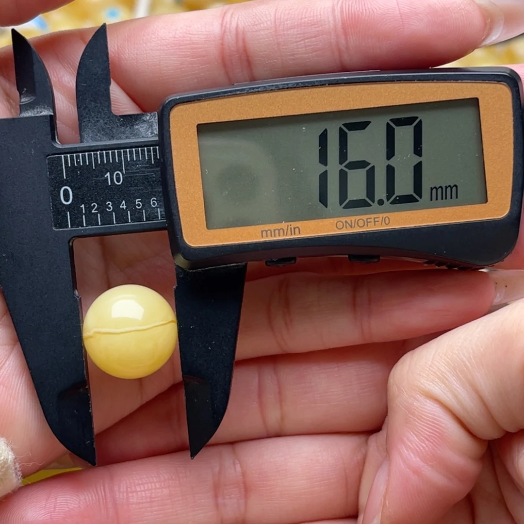 琥珀未镶嵌裸石蜜蜡圆珠笑