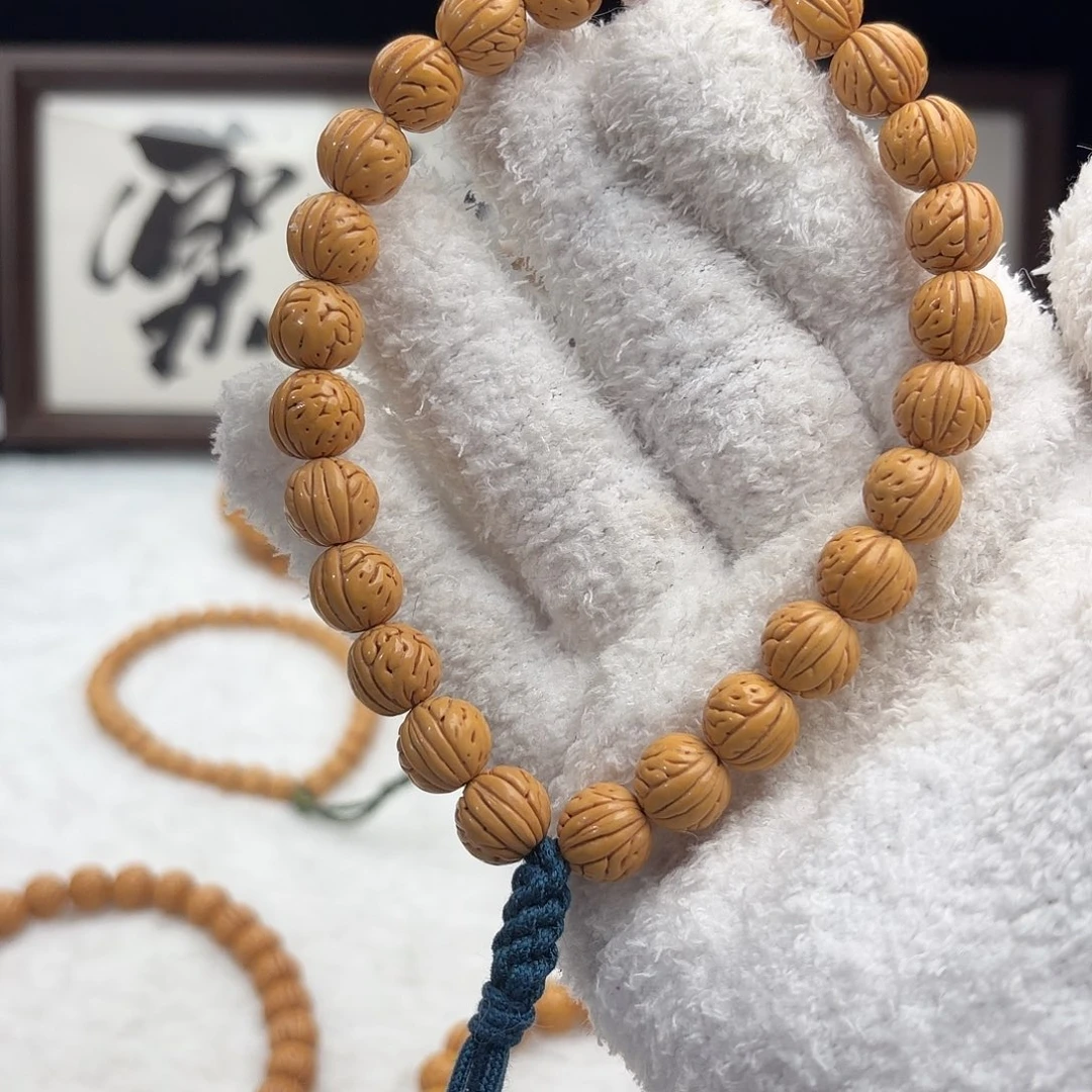 手串桃核1.1加「大肠脐中脐」野生桃核手持