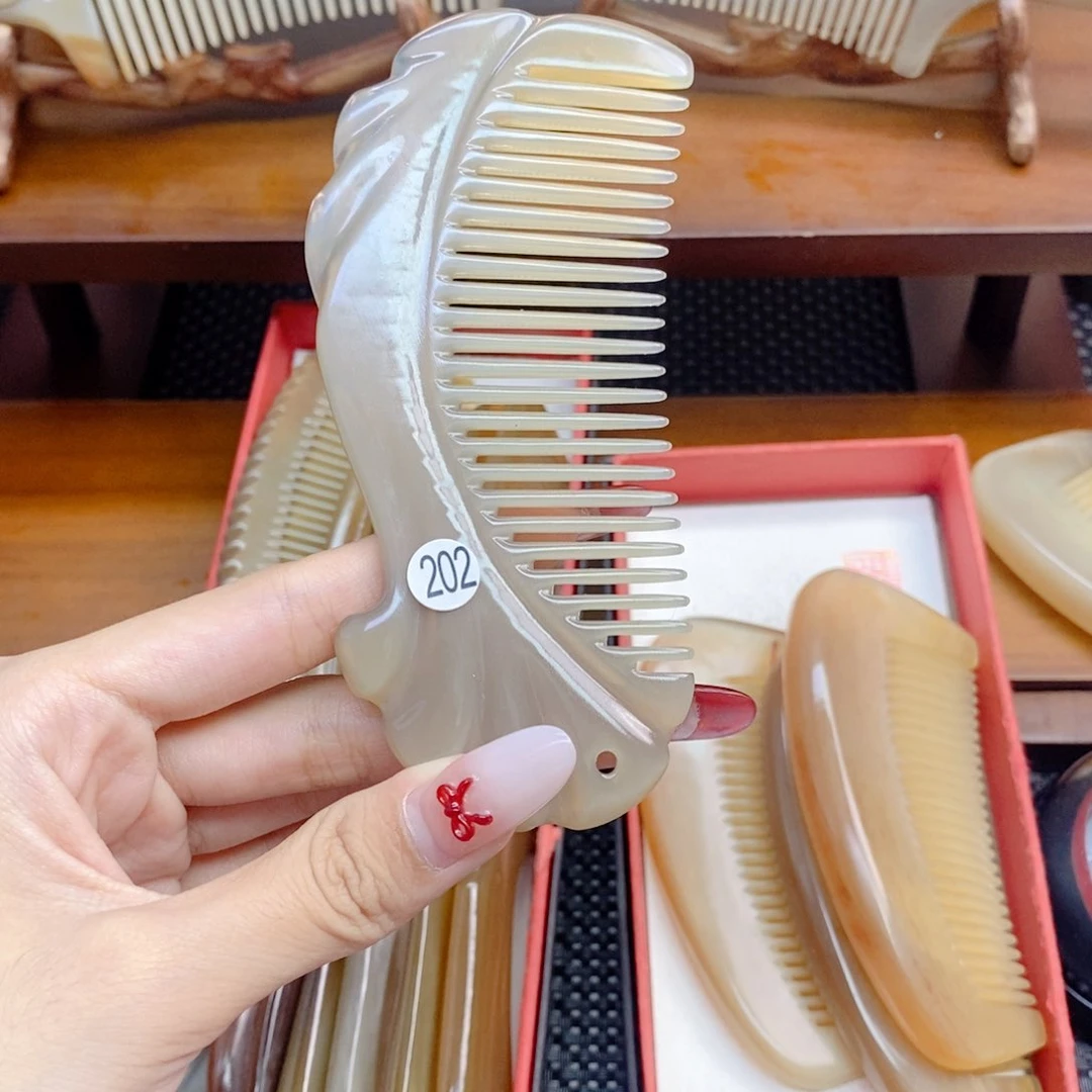纯手工制作纯牛角梳子