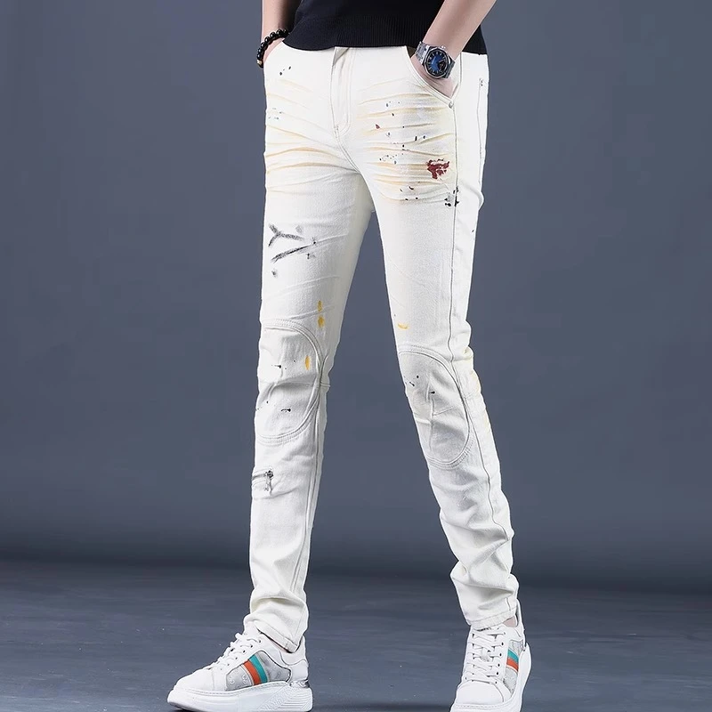 高端春夏新款高端弹力机车牛仔裤男士修身小脚休闲米白色拉链裤子