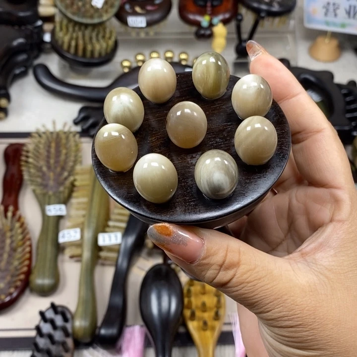 紫光檀九齿牛角按摩梳
