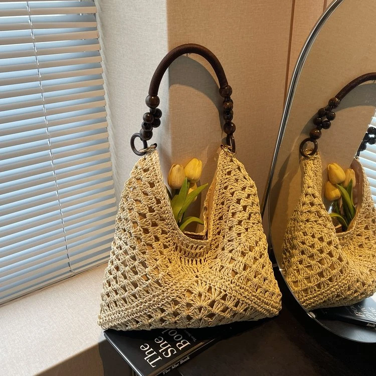 爆款超火草编包包女2025新款海边沙滩镂空单肩包手提编织菜篮子包