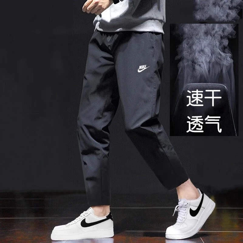 NIKE耐克正品休闲裤男裤2025新款轻薄透气梭织裤宽松运动裤DX0625