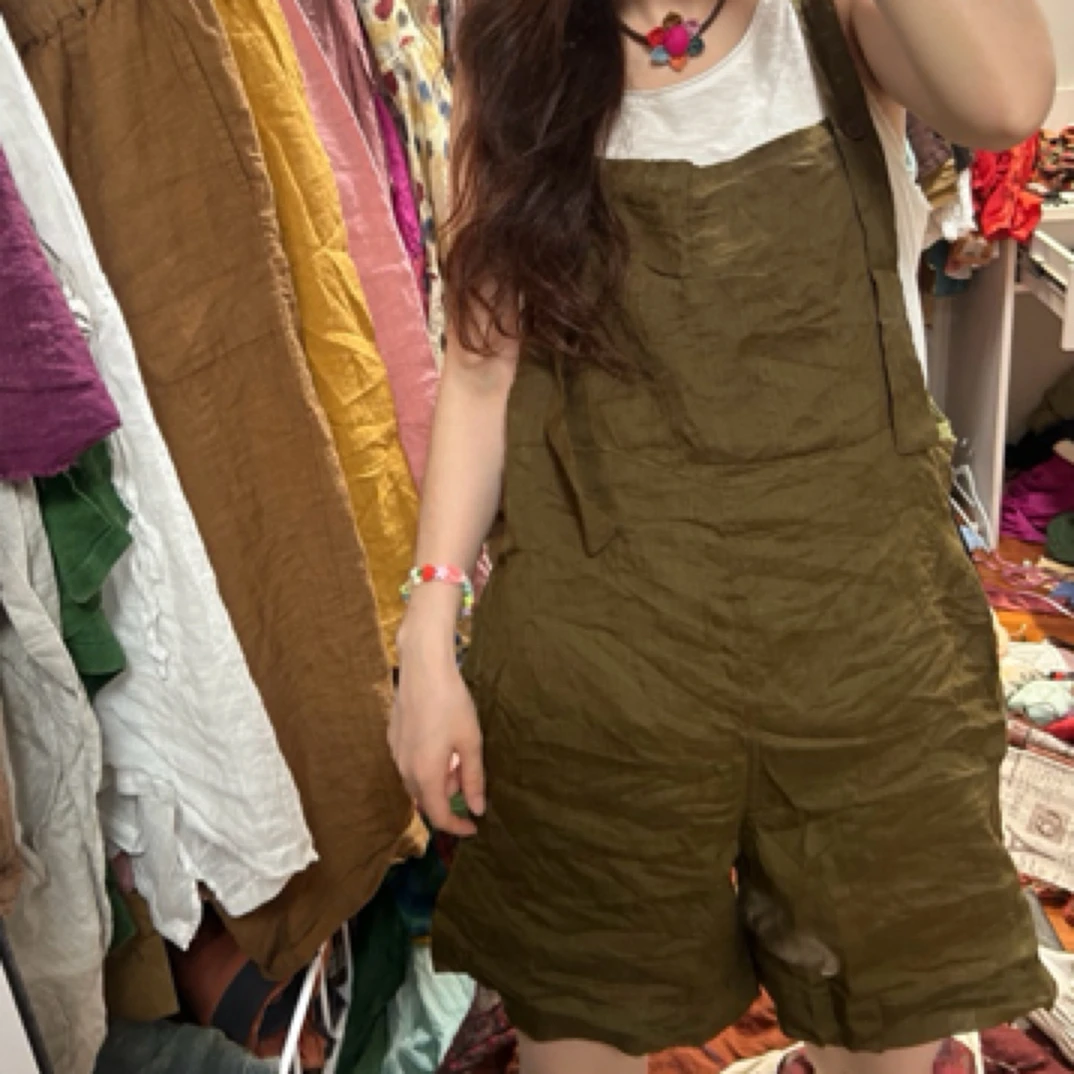 妞妞 新款苎麻口袋背带裤连体短裤