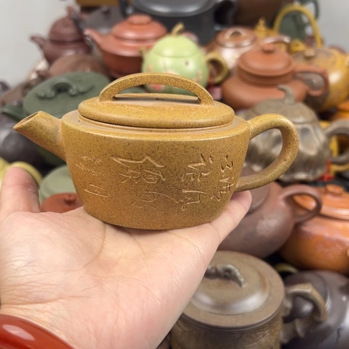 茶壶紫砂钮底裂了